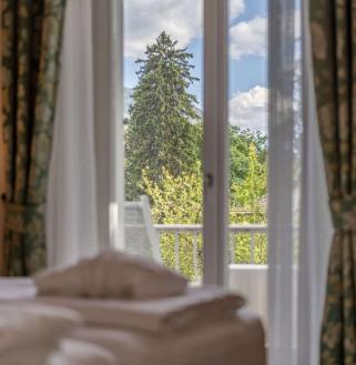 Zimmer im Hotel Adria in Meran Aussicht vom Schlafzimmer